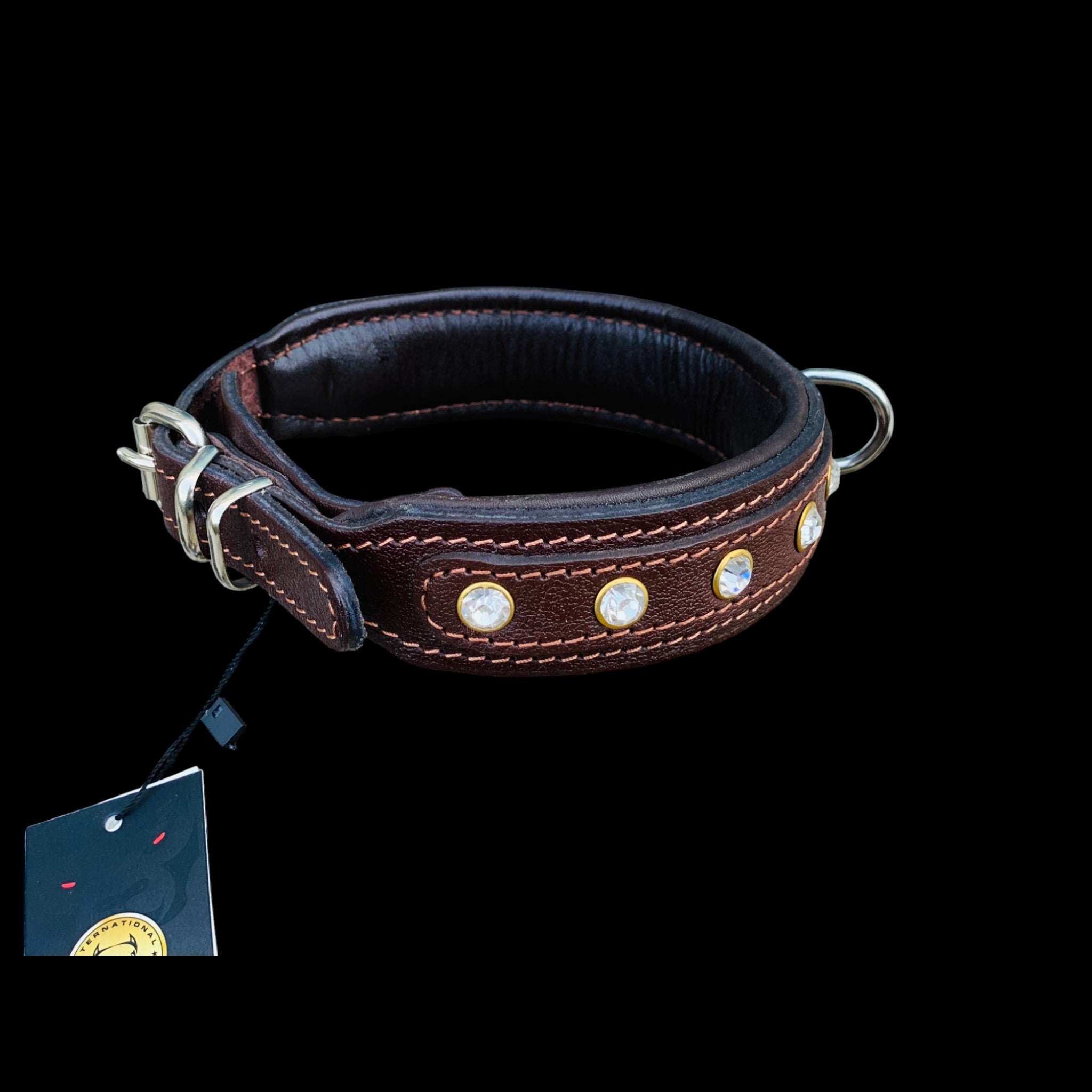 Side view of brown leather crystal studded dog collar with strong stitching and stainless steel D-ring.