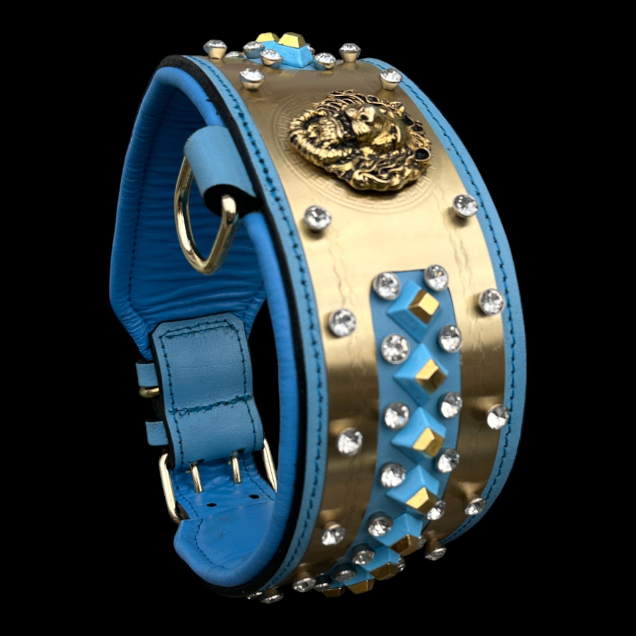 Handmade turquoise leather dog collar with gold lion emblem.