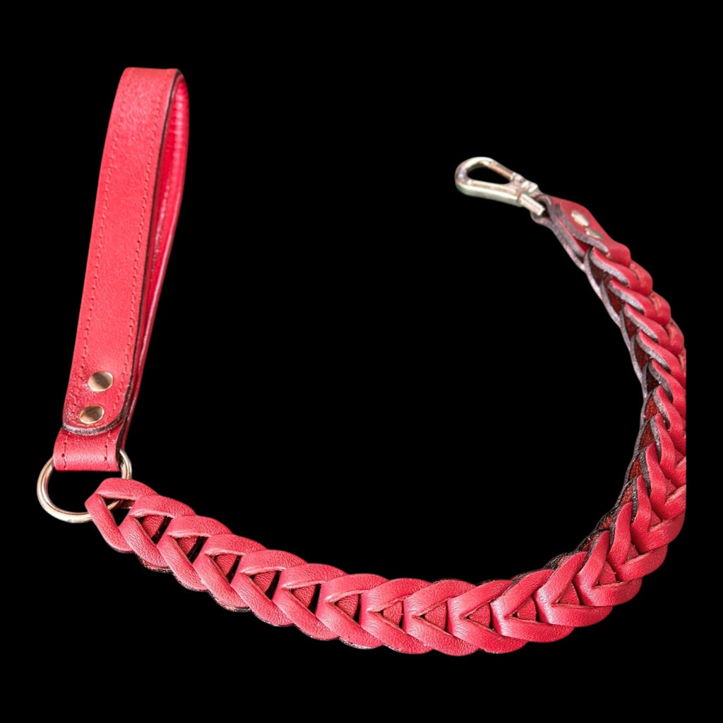 A&C Dog Collars 80cm red braided buffalo leather dog leash with a sturdy handle and heavy-duty metal snap hook.