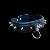 Angled photo of 1.57 inch wide black spiked leather collar with Bully logo centerpiece.