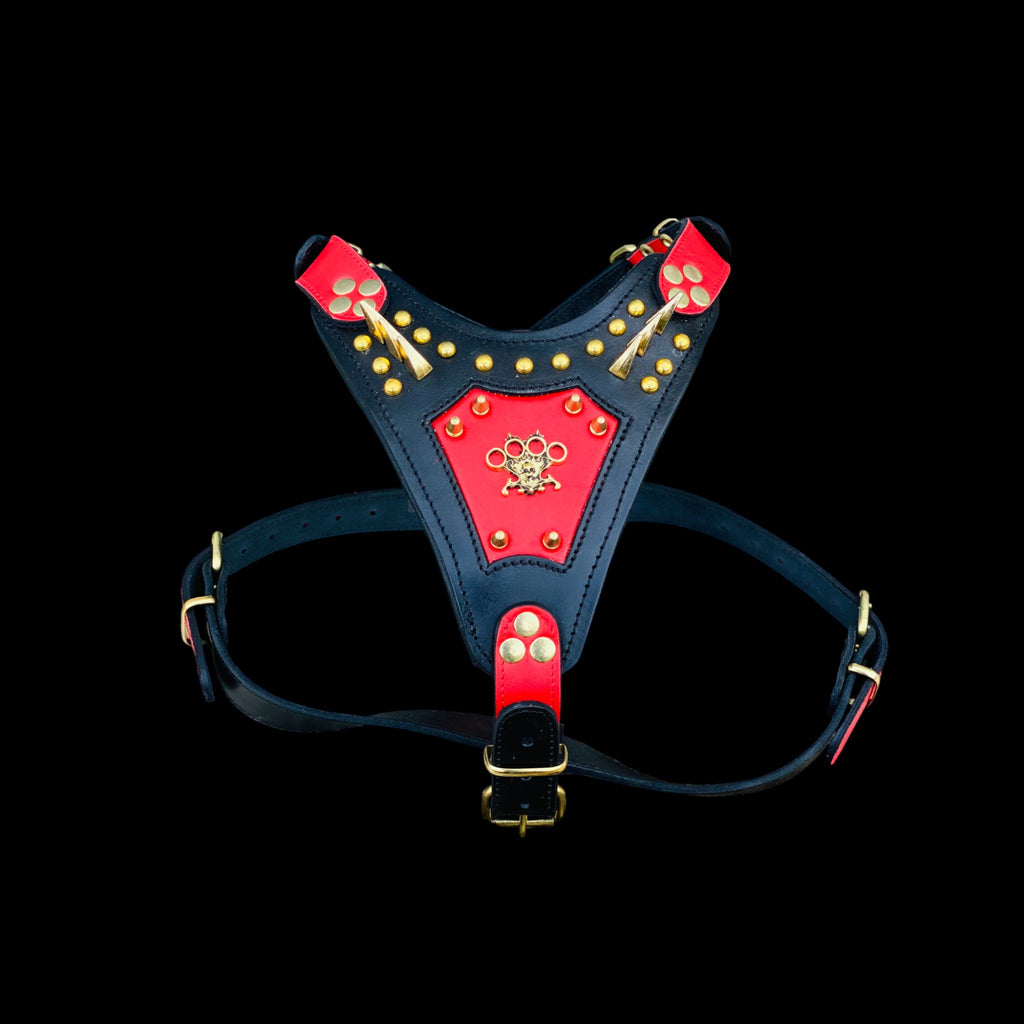 Handmade spiked chest harness with brass knuckle emblem