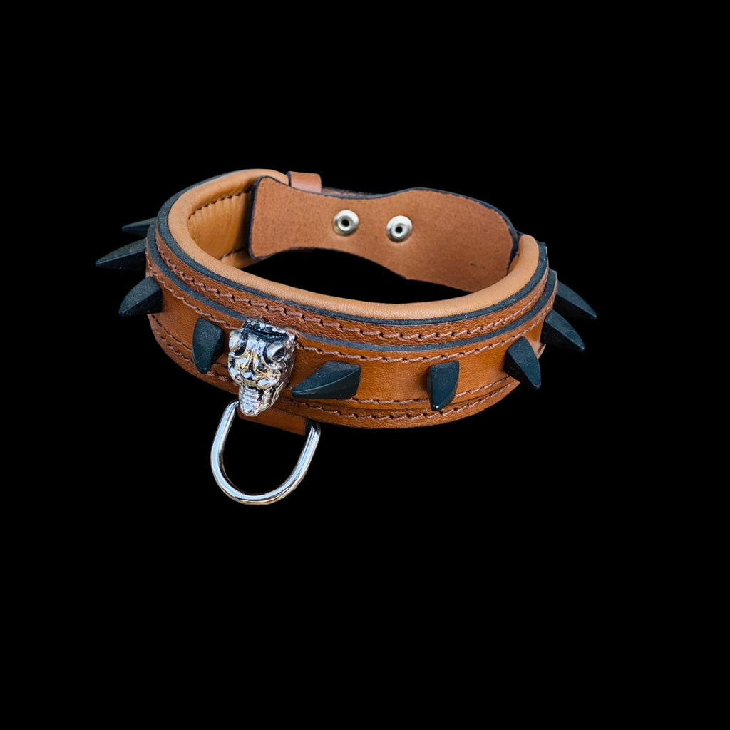 Top angle of 1.57 inch wide brown leather spiked dog collar with Bully logo and heavy duty steel D-ring