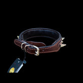 Side view of wide 4 cm spiked brown leather dog collar featuring reinforced stitching, metal spikes and stainless steel D-ring