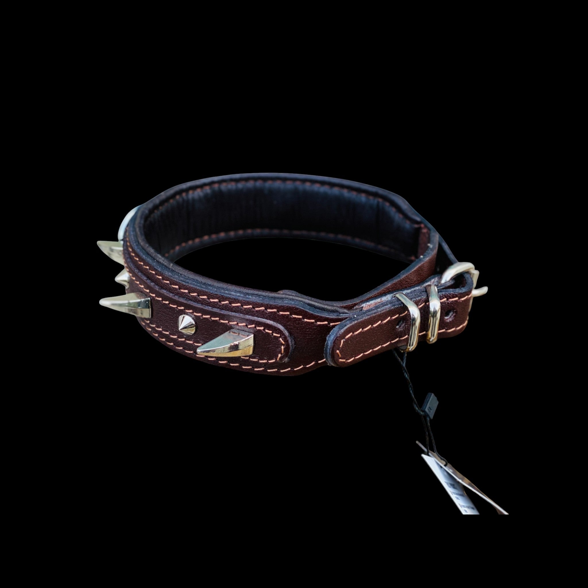 Back view of handmade brown leather spiked dog collar, 1.57 inch wide with steel buckle and durable construction for Cane Corso and Rottweiler