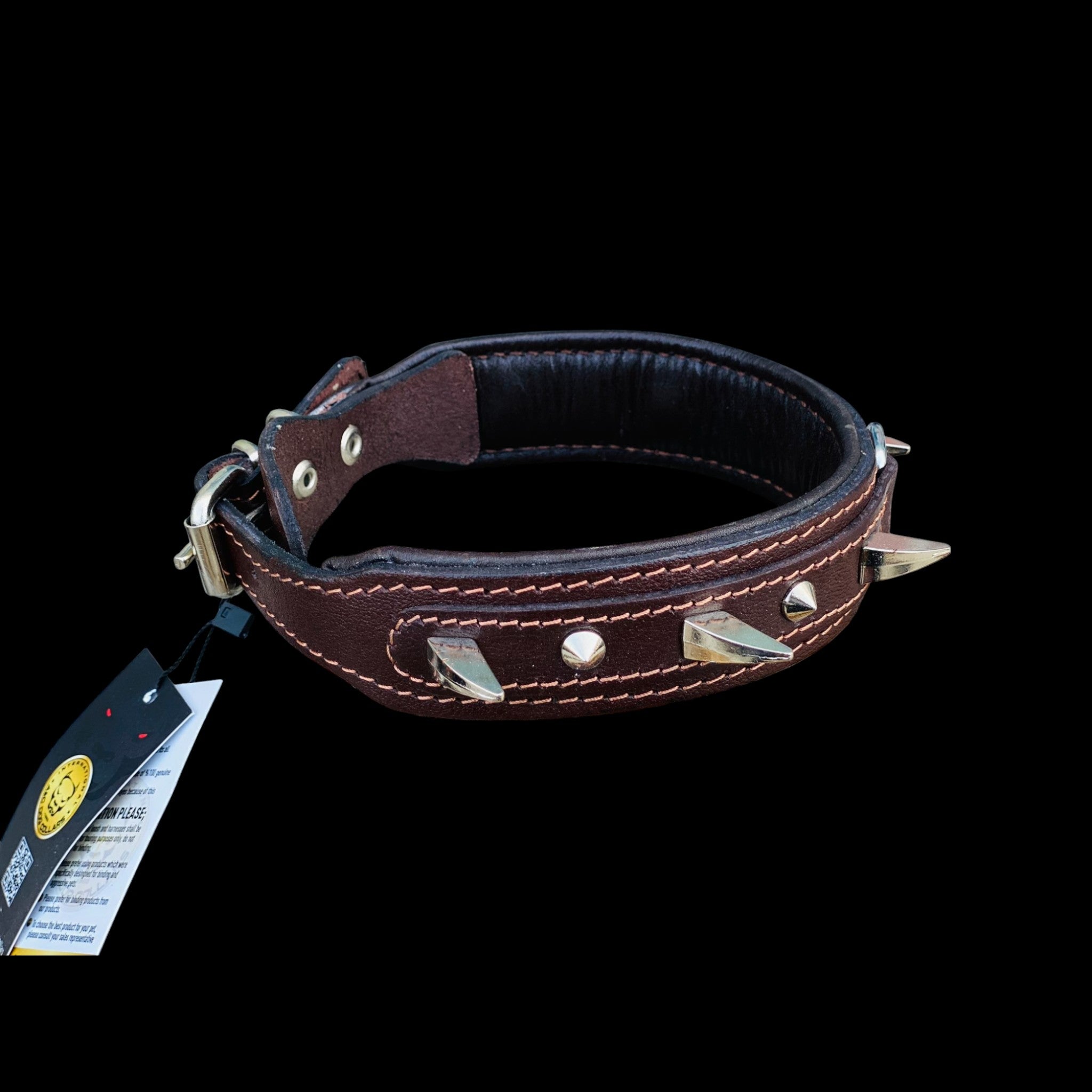 Angled photo of 4 cm wide brown leather dog collar with strong metal spikes and secure steel D-ring for large powerful breeds