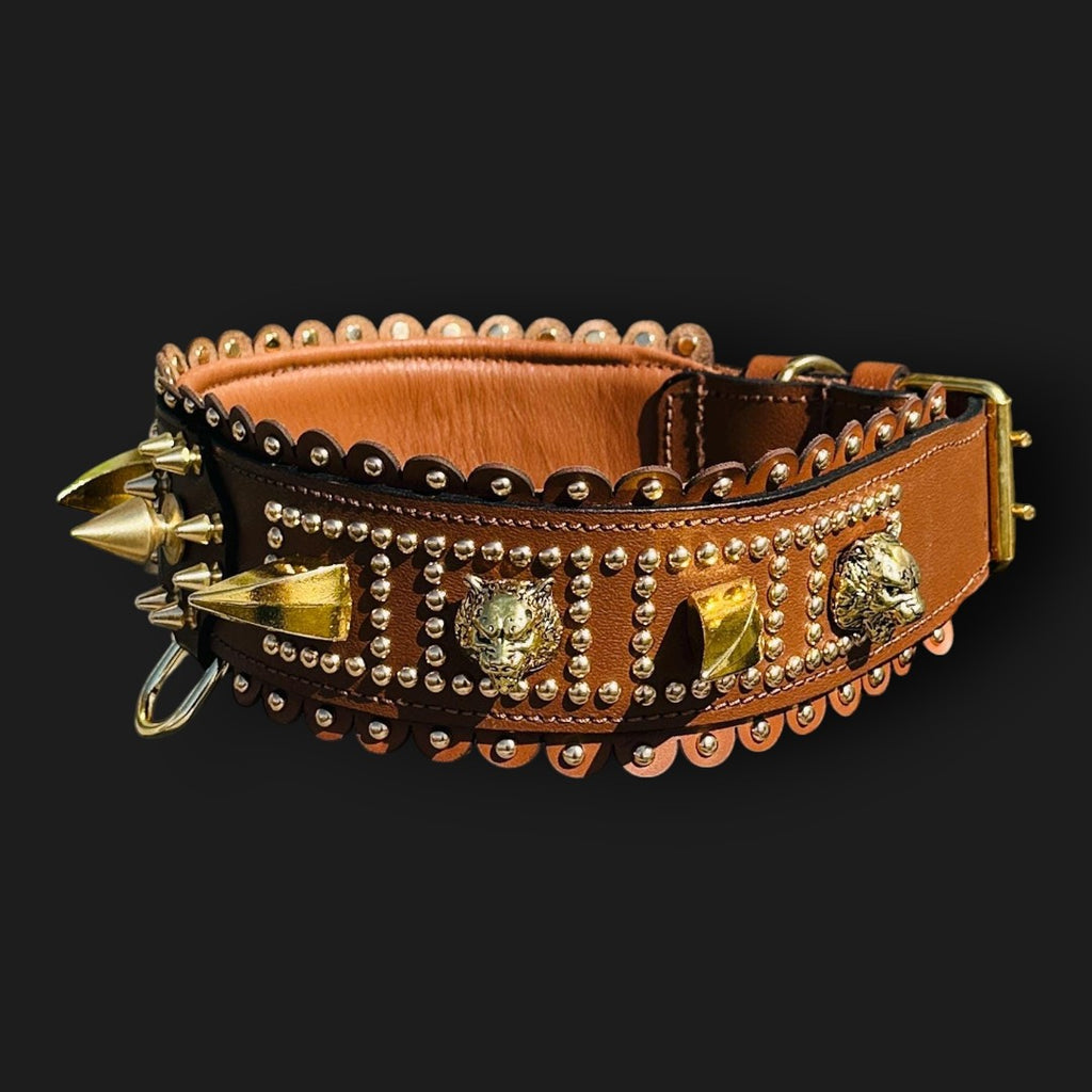 Handmade tan leather dog collar with lion emblem, wide design, crafted by A&C Dog Collars for a stylish and durable pet accessory.