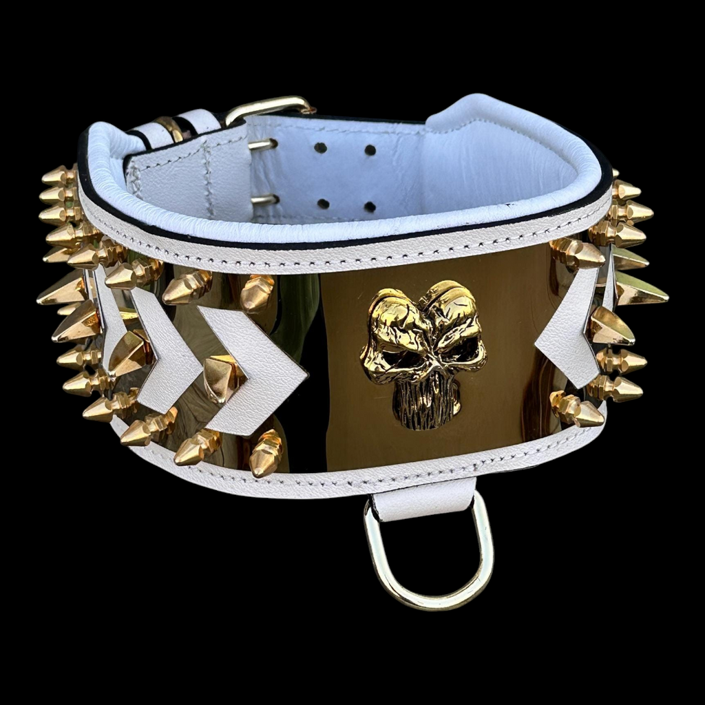 White buffalo leather spiked dog collar with gold Punisher emblem, handmade luxury design, featuring metal spikes and buckle closure.