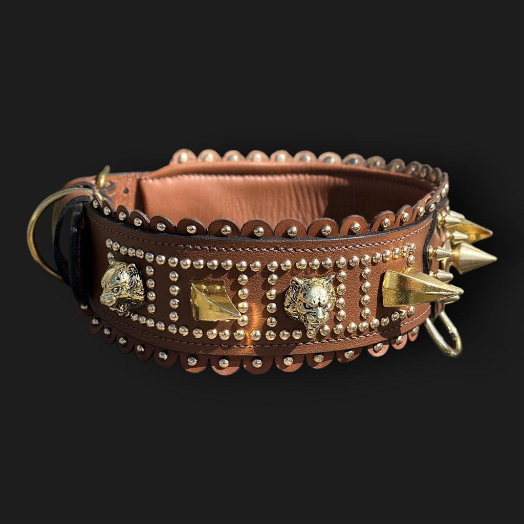 Handmade tan leather dog collar with a lion emblem, featuring a wide strap and sturdy buckle, made by A&C Dog Collars.