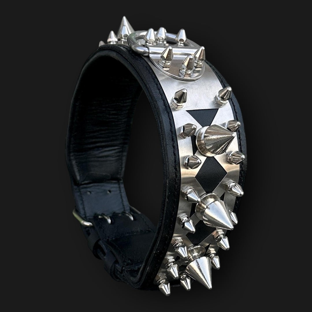 Handmade spiked leather dog collar with custom engraved name plate, featuring sturdy spikes and adjustable buckle from A&C Dog Collars.