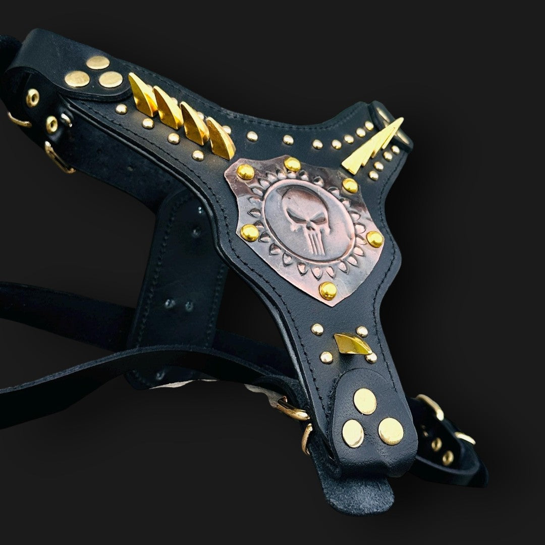Handmade buffalo leather dog harness with Punisher copper plate and gold rivets, featuring adjustable straps and sturdy metal hardware.