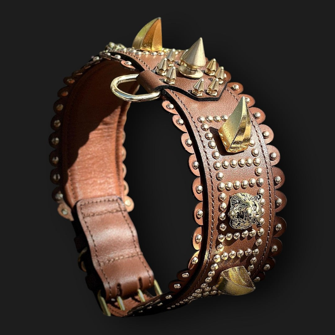 Handmade tan leather dog collar with lion emblem from A&C Dog Collars, featuring sturdy design and decorative lion detail.