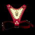 Red leather dog chest harness with gold skull logo and studs
