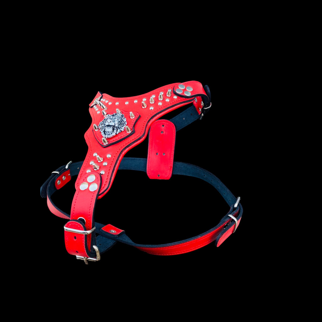 Red spiked leather harness with lion logo for German Shepherd